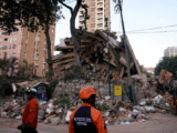 Equipes de emergência em frente a escombros de prédio derrubado por terremotos históricos em Caracas, na Venezuela, em 25 de junho de 2026. — Foto: REUTERS/Leonardo Fernandez Viloria